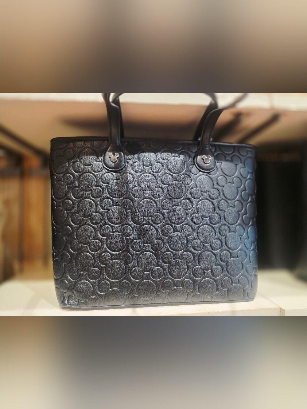 Disney Parks black Faux-Leather Tote Bag featuring an all-over debossed...